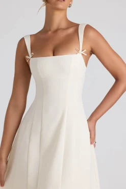 Oh Polly Georgette And Chiffon^Bow-Detail Pleated A-Line Midi Dress in Ivory