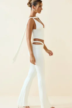 Oh Polly Bottoms^Petite Cut-Out Mid-Rise Flared Trousers in Vanilla