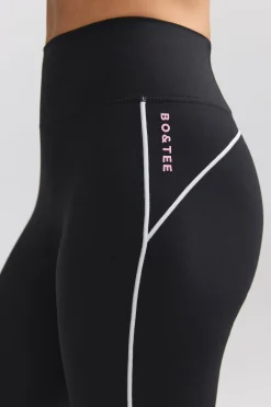 Oh Polly Petite^Petite Soft Active Contrast-Trim Flared Trousers in Black