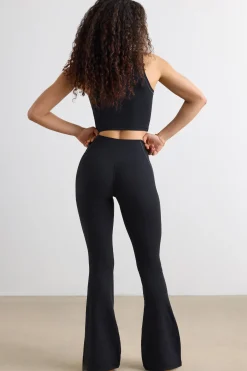 Oh Polly Petite^Soft Active Petite Flared Trousers in Black
