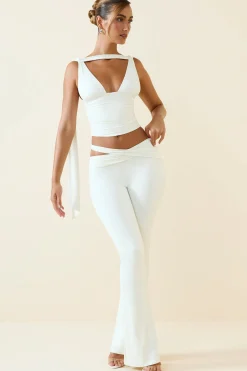 Oh Polly Bottoms^Tall Cut-Out Mid-Rise Flared Trousers in Vanilla